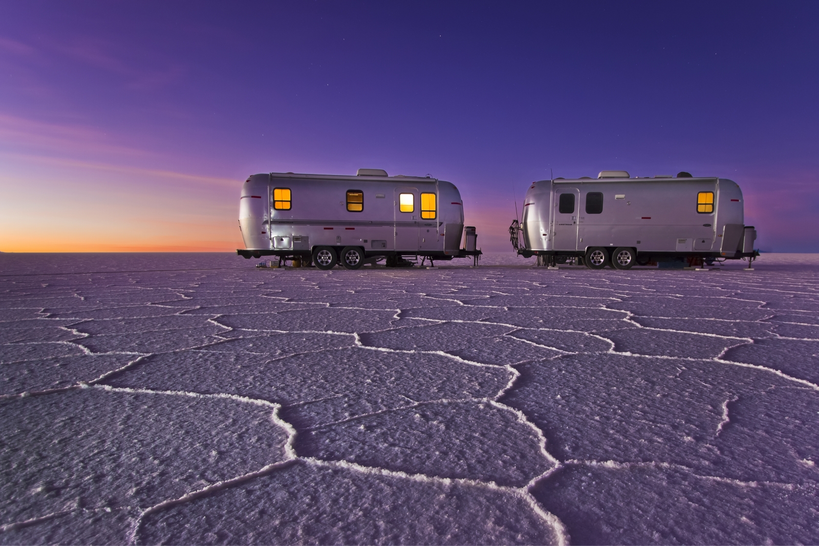 Purple sky of Deluxe Airstream Camper in Bolivia Salt Flats