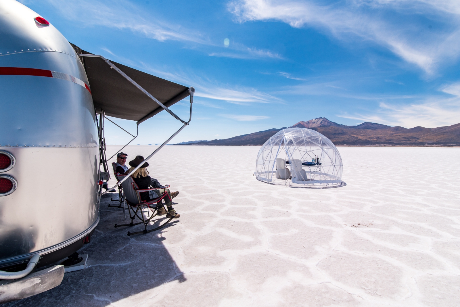 Sphere of Deluxe Airstream Camper in Bolivia Salt Flats