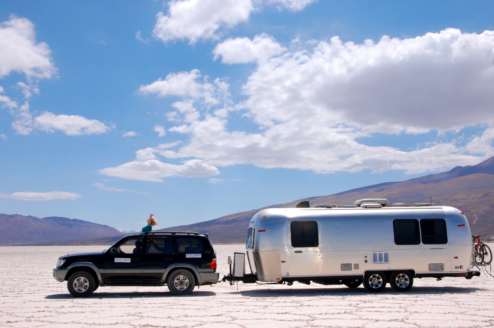 Towing of Deluxe Airstream Camper in Bolivia Salt Flats