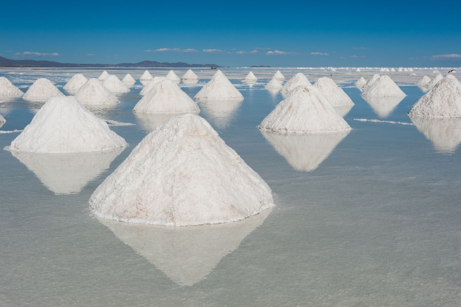 White cone shaped salt mounds in Salar de Uyuni Boliva
