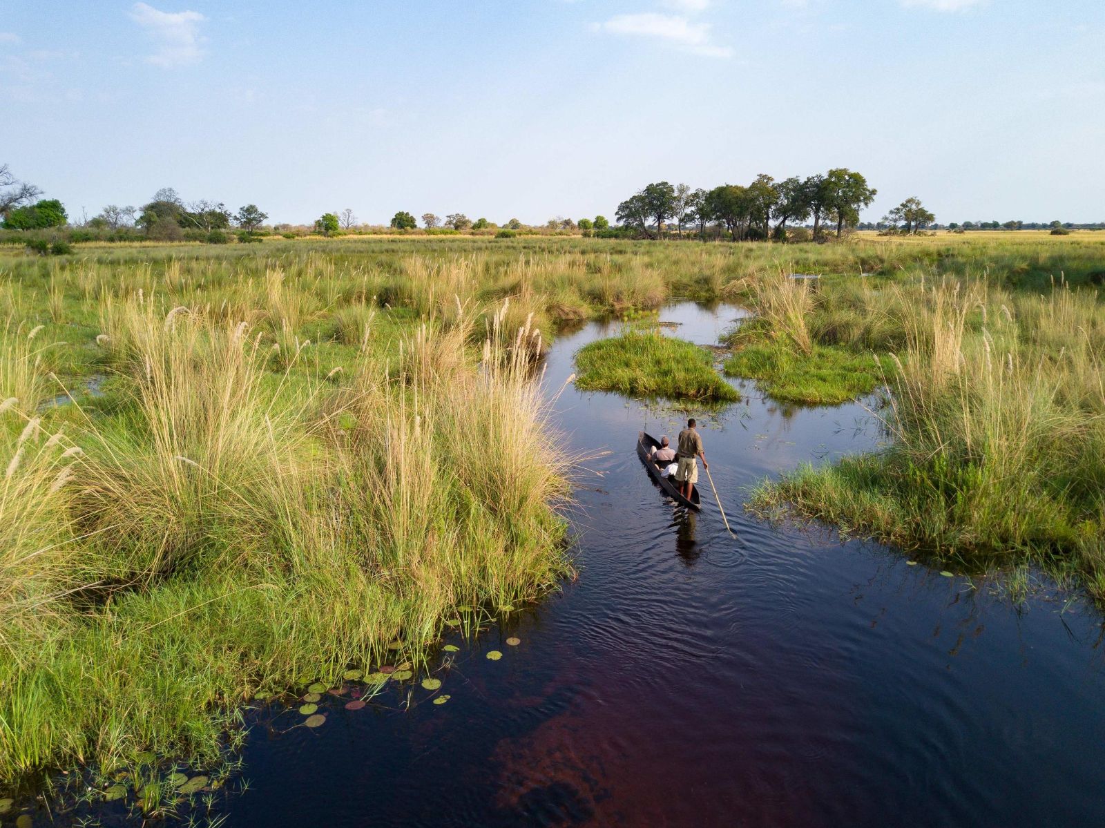 Canoeing on the grounds of Duba Explorers Camp on the Okavango Delta in Botswana