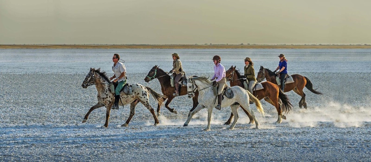 Horse riding through the salt pans at Jacks Camp Botswana