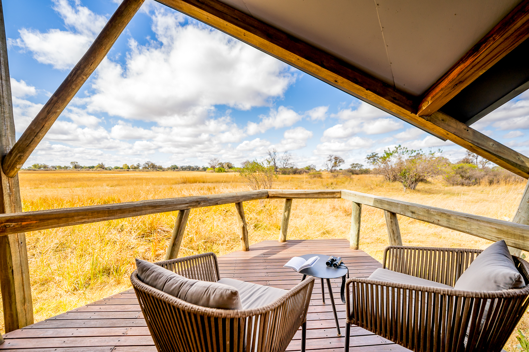A guest terrace overlooking the plains from Kwando Splash Camp in the Okavango Delta