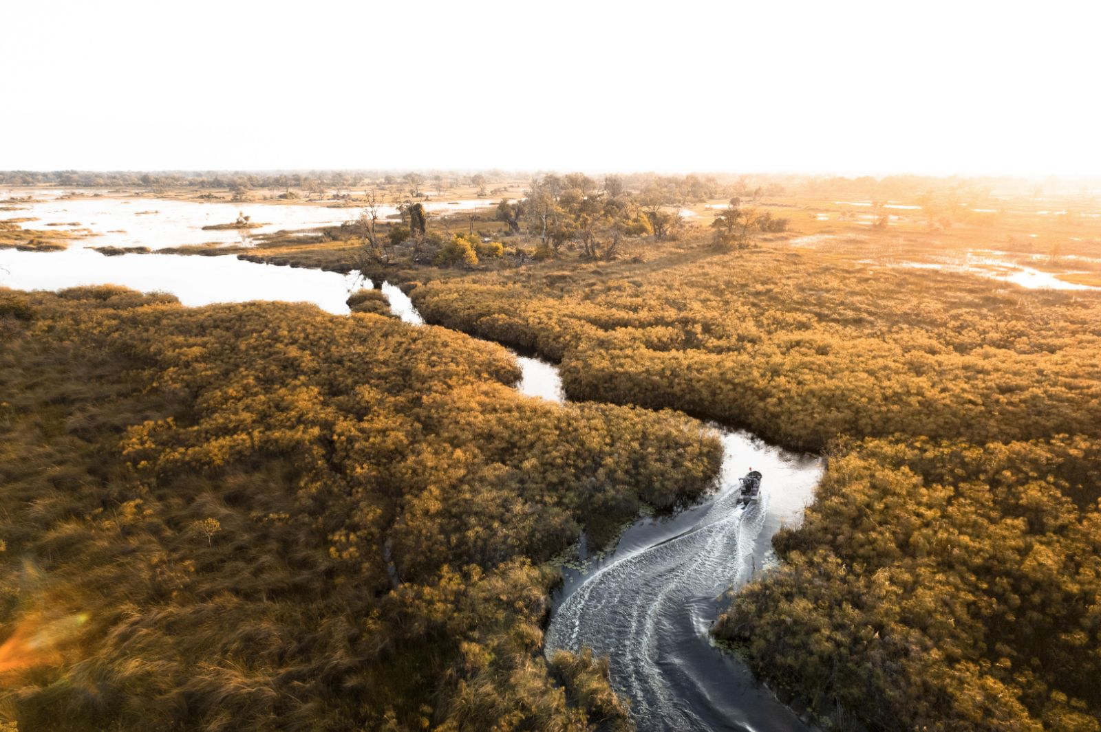 Aerial view of a boat excursion from Vumbura Plains in Botswana's Okavango Delta