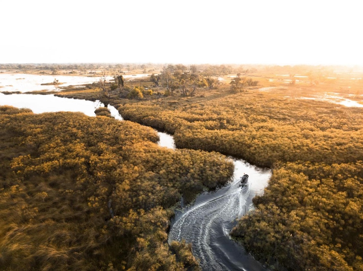 Aerial view of a boat excursion from Vumbura Plains in Botswana's Okavango Delta