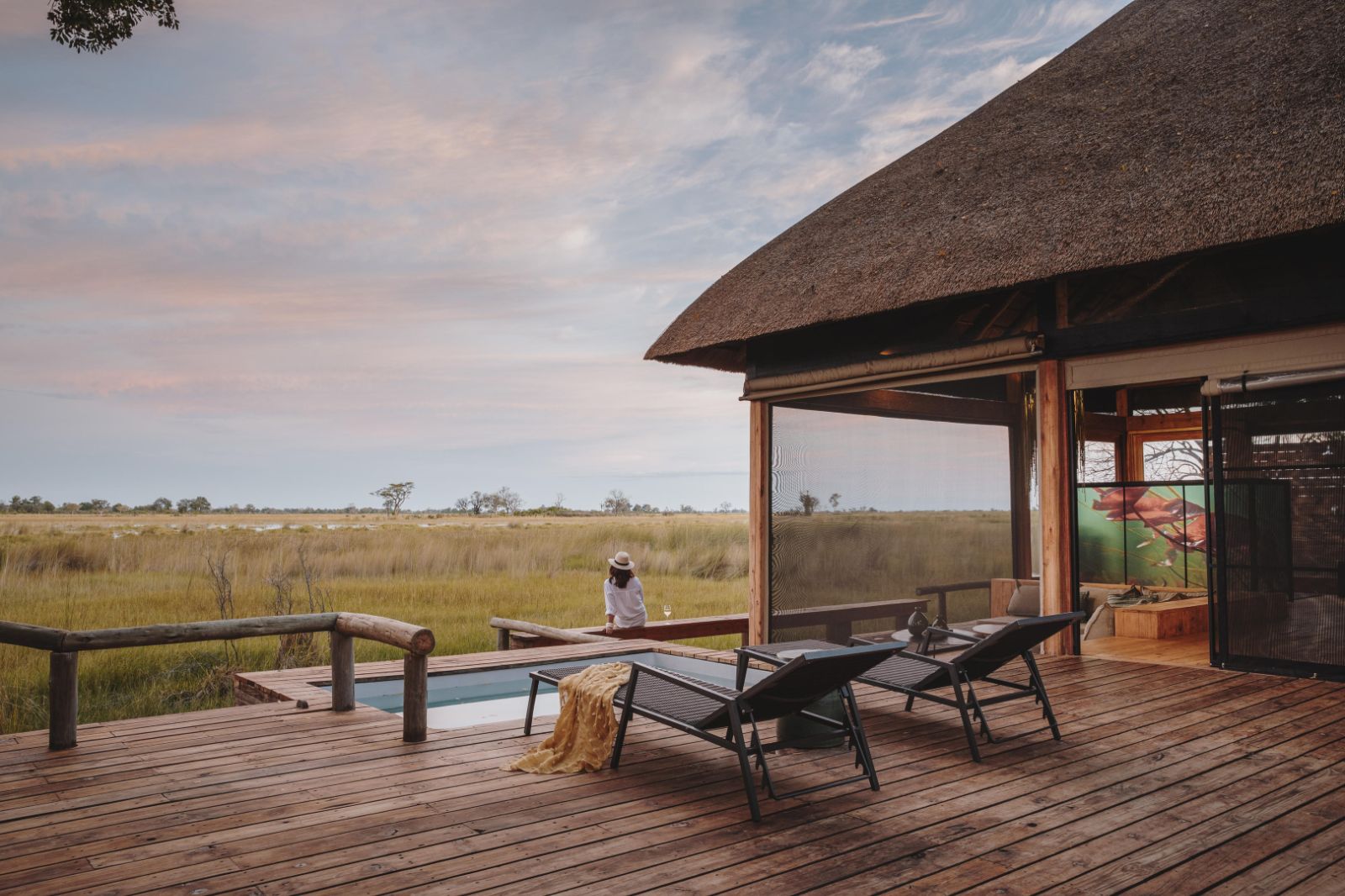 Sun loungers and private plunge pool at Vumbura Plains  in the Okavango Delta in Botswana