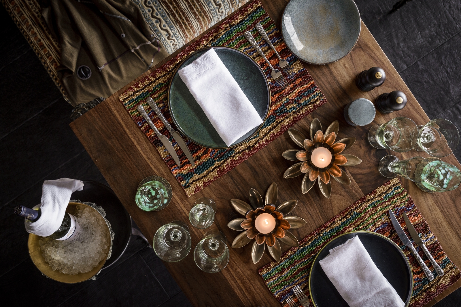 Beautifully set dining table with flower-decor at luxury safari camp Xigera in the Okavango Delta, Botswana