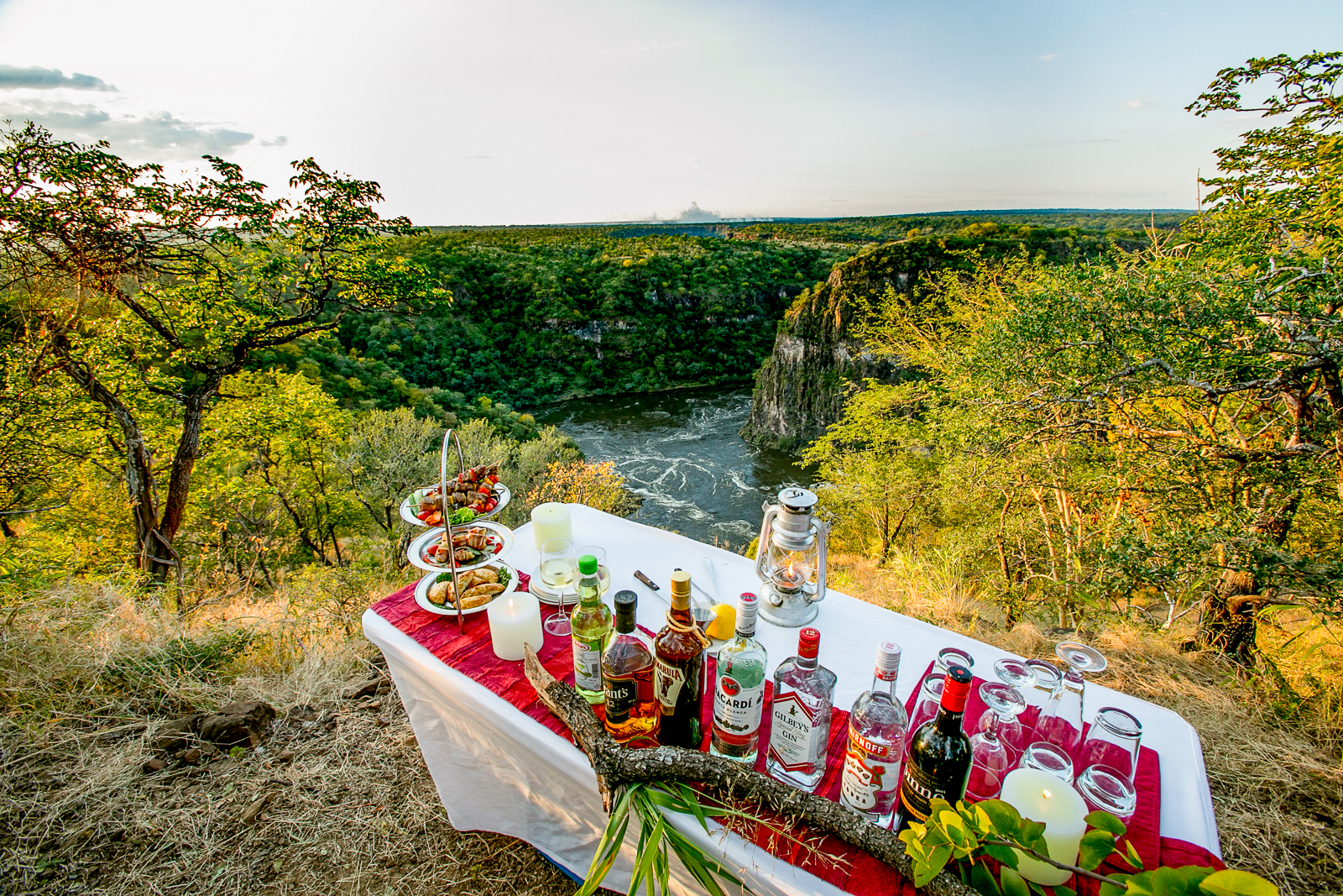 Drinks served on the edge of a gorge for guests of The Elephant Camp near the Victoria Falls