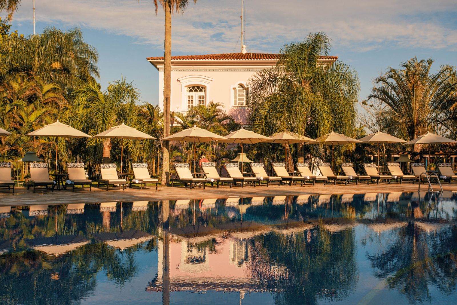 Loungers by the side of the pool at Belmond Hotel das Cataratas near the Iguazu falls in Brazil