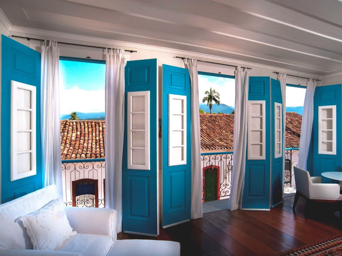 Guest suite shutters and balcony at Casa Turquesa in Paraty, Brazil