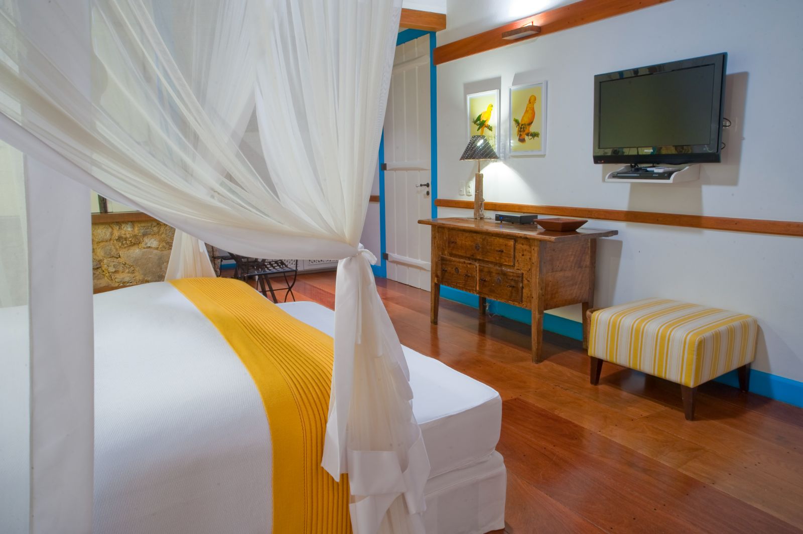 Yellow guest suite at Casa Turquesa in Paraty, Brazil