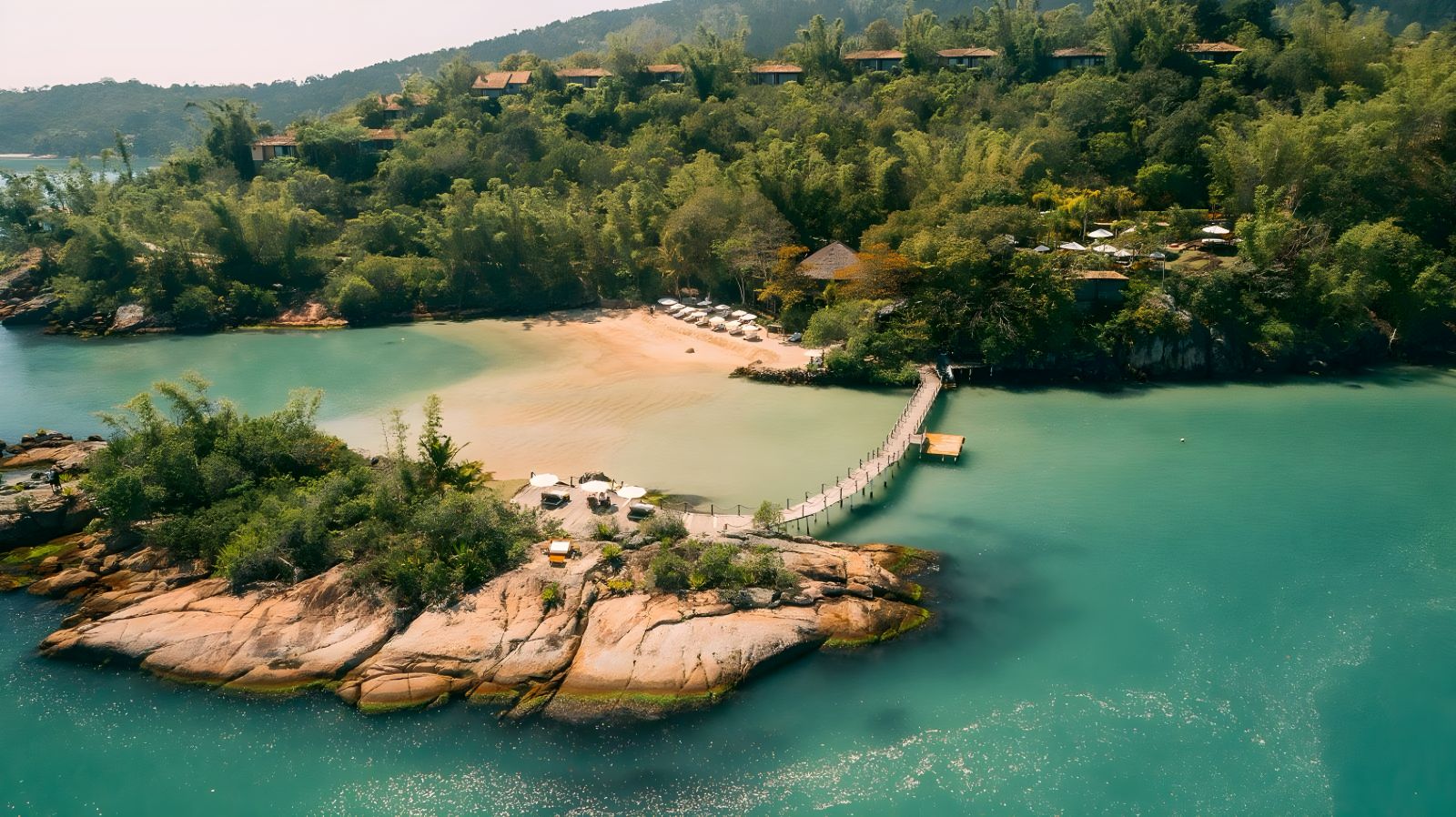 Aerial view of beach and villas as Ponta Dos Ganchos Excusive Resort in Brazil