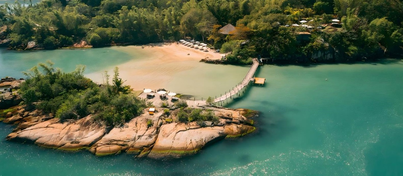 Aerial view of beach and villas as Ponta Dos Ganchos Excusive Resort in Brazil