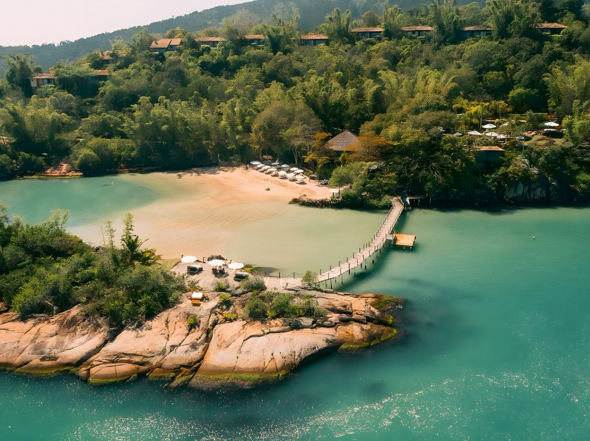Aerial view of beach and villas as Ponta Dos Ganchos Excusive Resort in Brazil