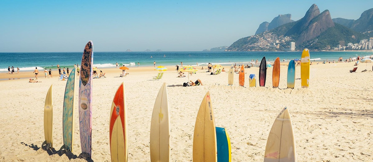 Surfboards lined up along the beach in Rio