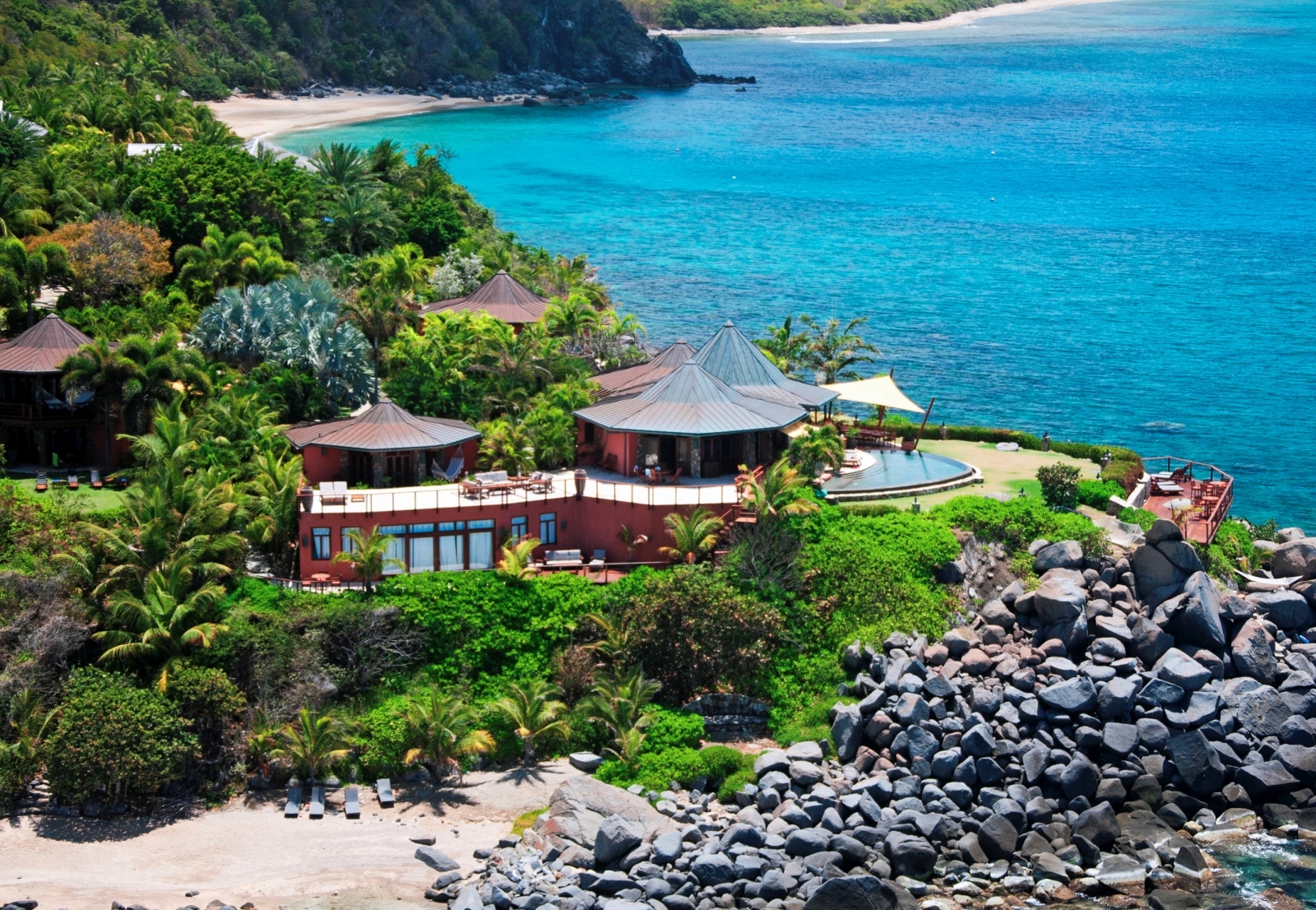 Aerial of the villa with beaches either side