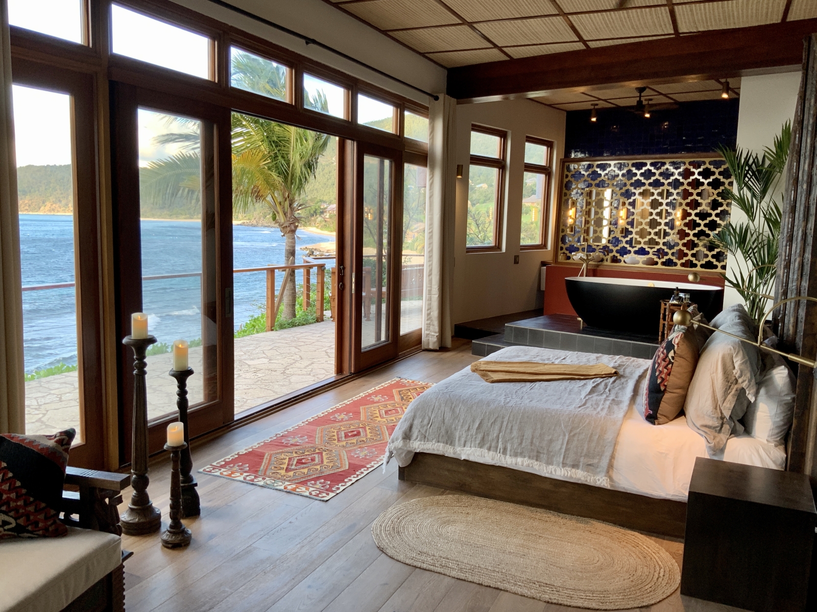 Double bed with private balcony and sea views