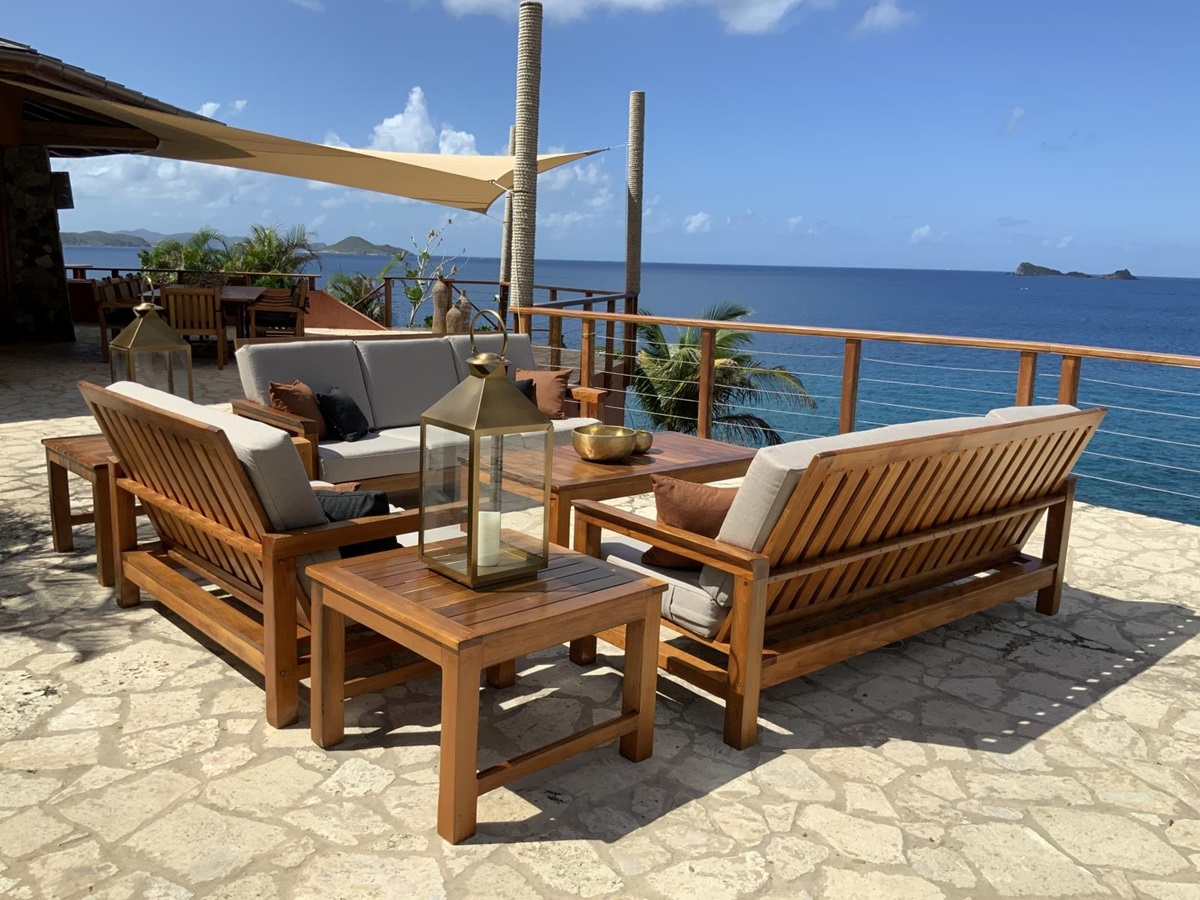 Outdoor seating during the day with blue sky and views