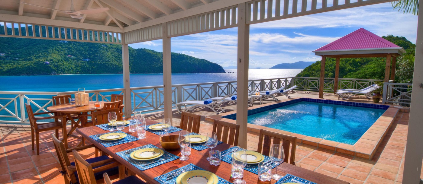 Outdoor dining and siwmming pool of Outer Banks, British Virgin Islands