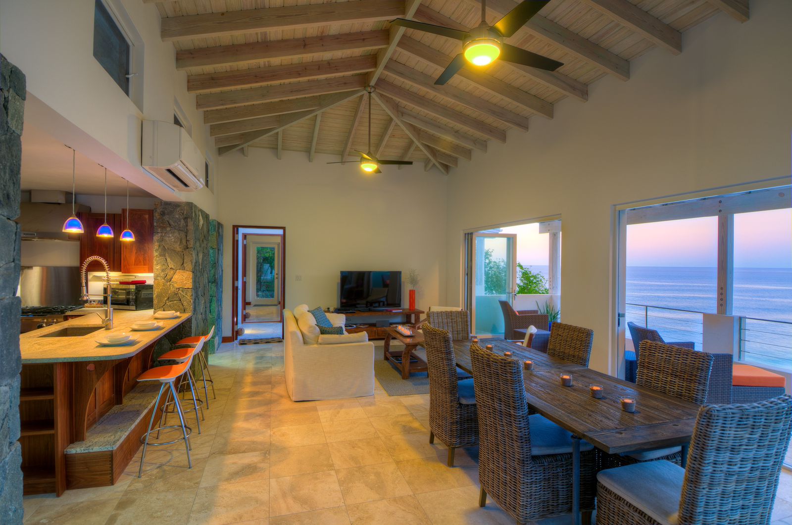 living room and dining table of swimming pool of Villa Soleile, British Virgin Islands