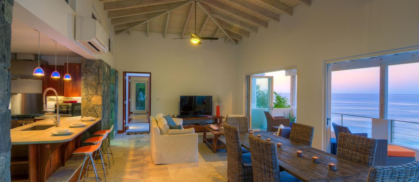 living room and dining table of swimming pool of Villa Soleile, British Virgin Islands