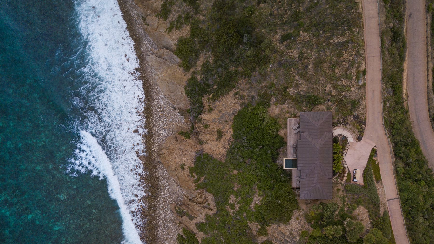Aerial shot of villa and coast at Whale Point in the Nut Oil Bay Resort in the British Virgin Islands