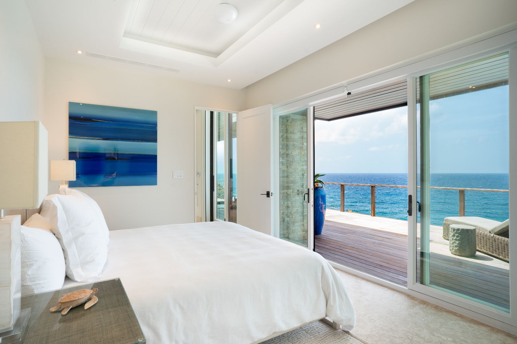 Bedroom with sea views at Whale Point in the Nut Oil Bay Resort in the British Virgin Islands