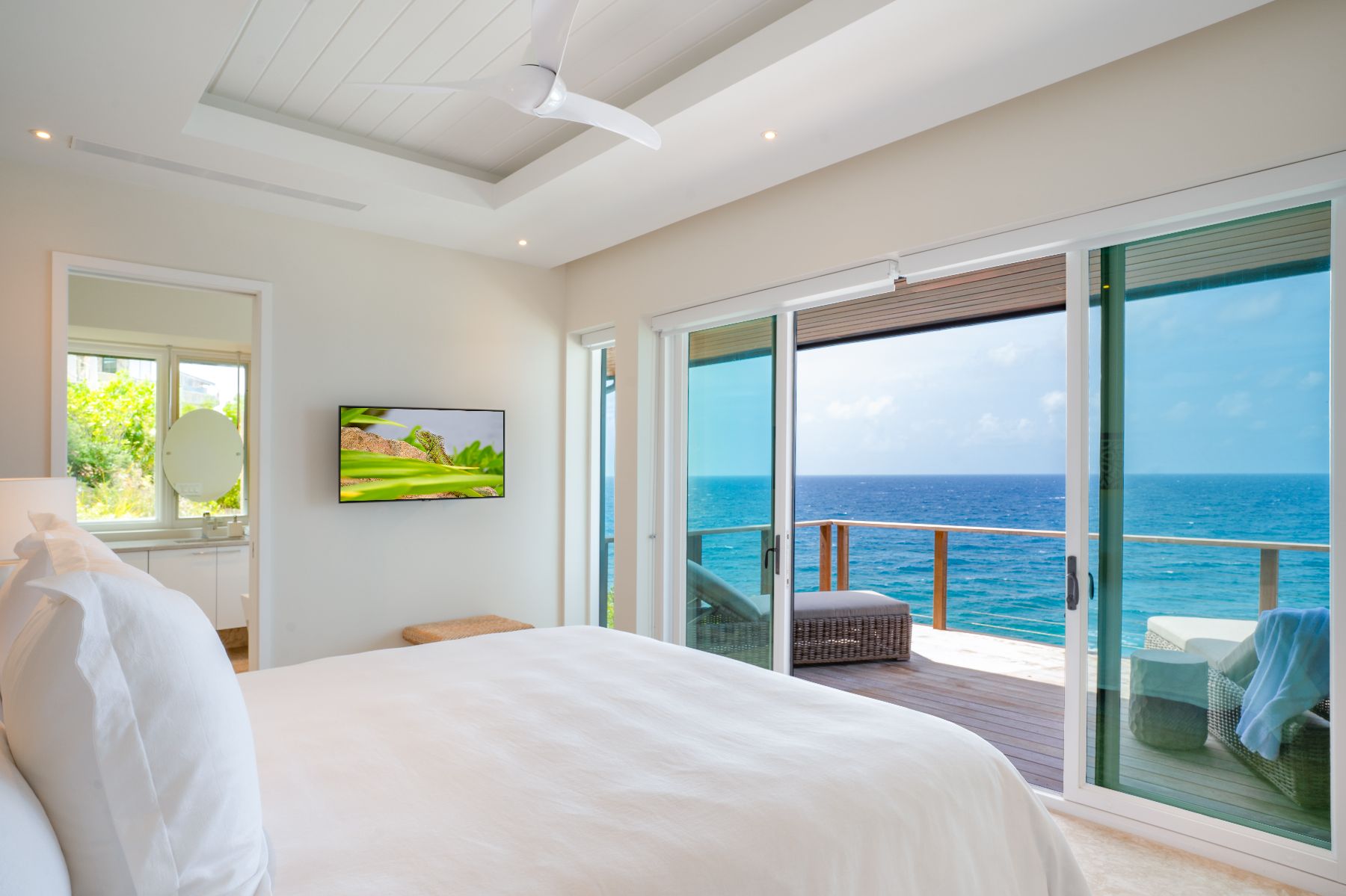 Bedroom with sea views at Whale Point in the Nut Oil Bay Resort in the British Virgin Islands