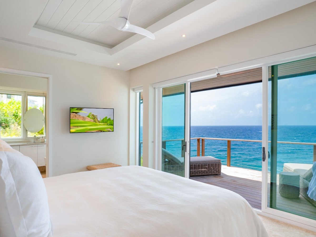 Bedroom with sea views at Whale Point in the Nut Oil Bay Resort in the British Virgin Islands