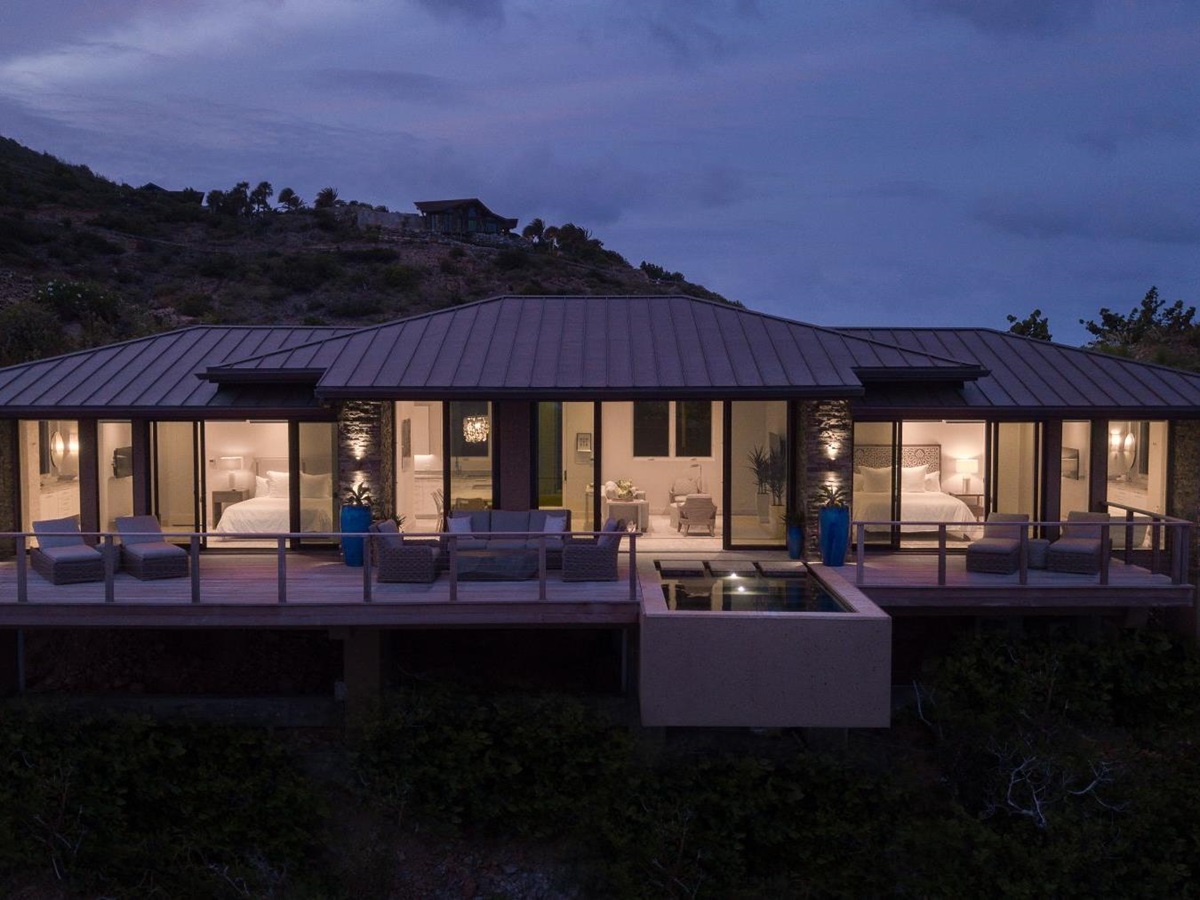 Exterior of villa at night at Whale Point in the Nut Oil Bay Resort in the British Virgin Islands