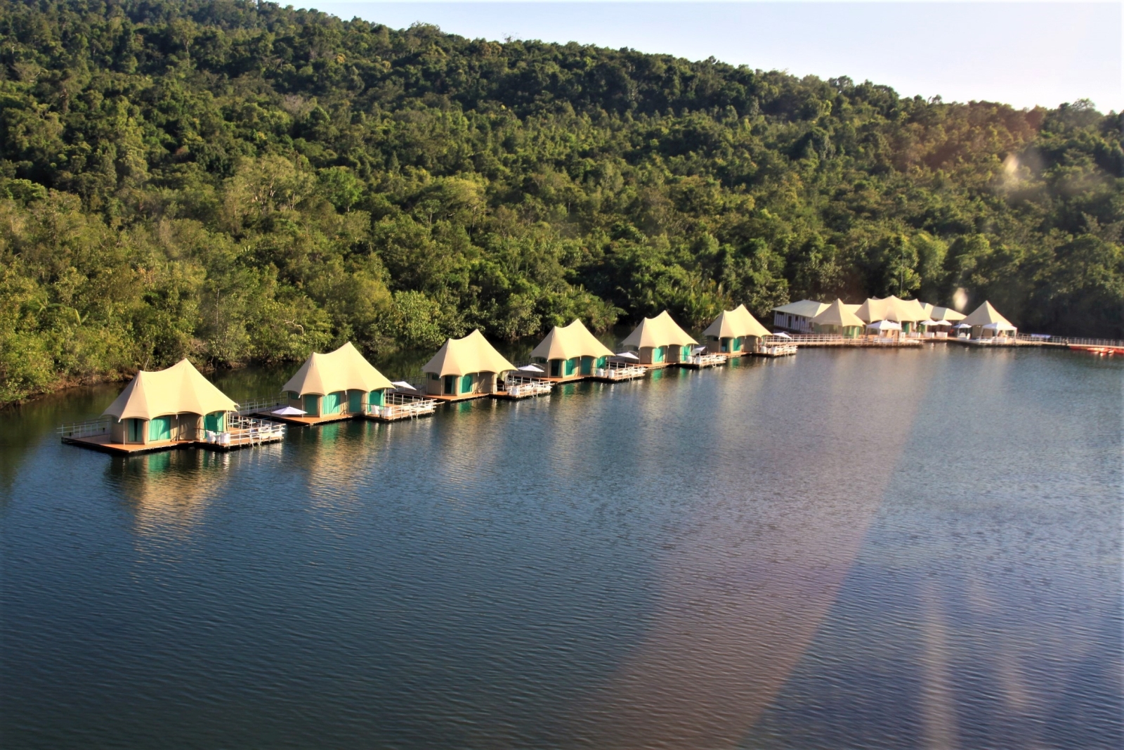 Aerial of tented accommodation along a pier