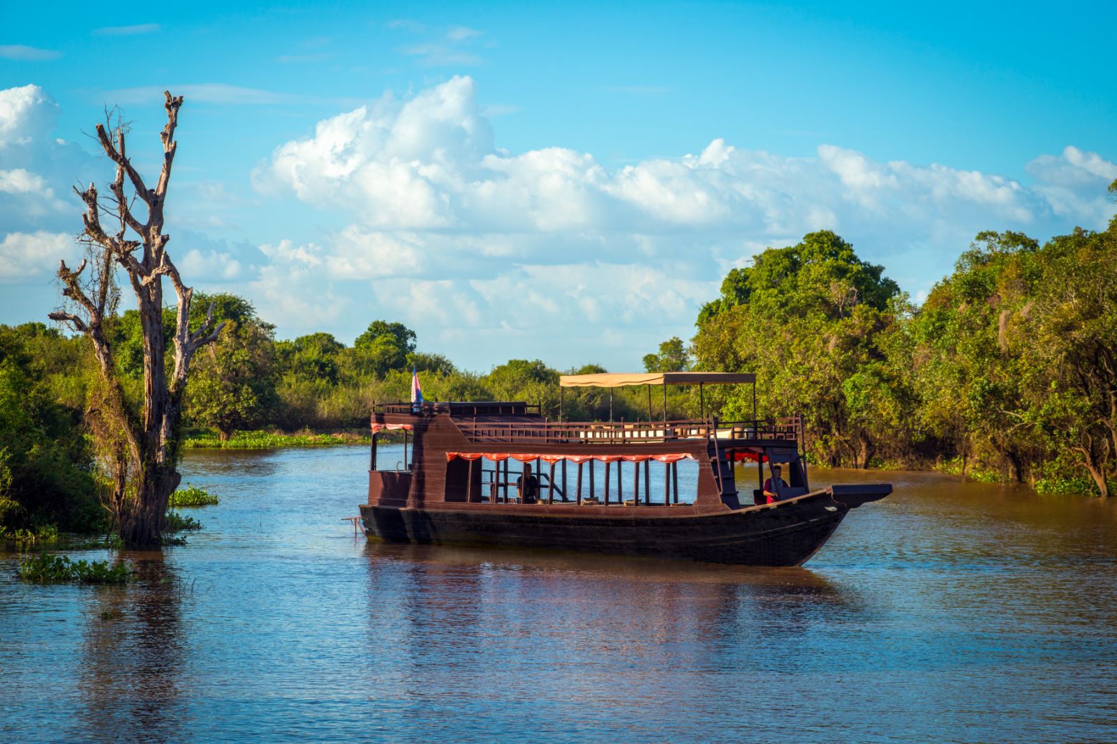 Boat excursion near the grounds of Amansara in Siem Reap, Cambodia