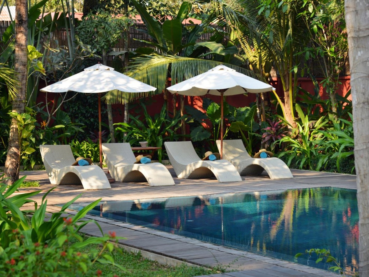 Pool loungers by the swimming pool at Maison Polanka in Cambodia's Siem Reap