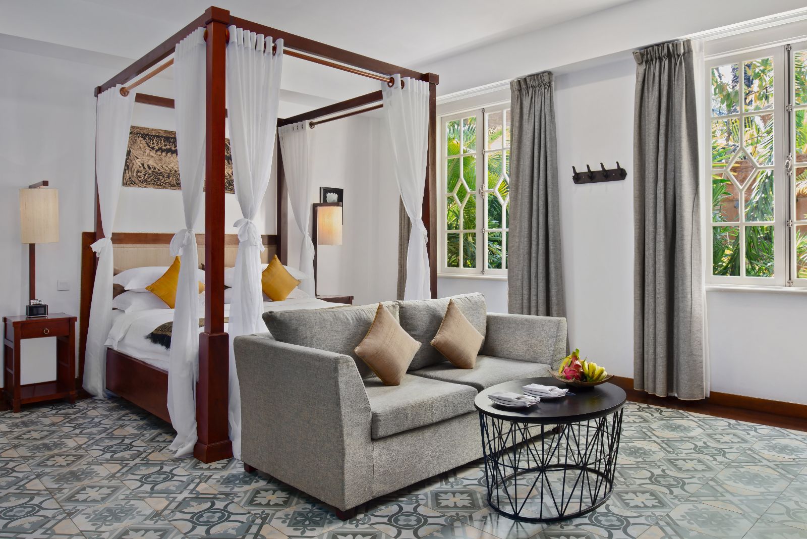 Aspara guest suite bedroom at Palace Gate Hotel in Phnom Penh, Cambodia
