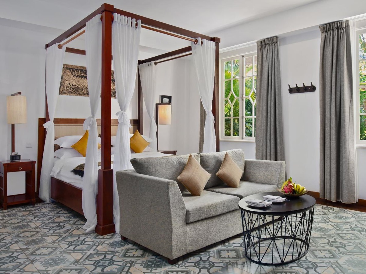 Aspara guest suite bedroom at Palace Gate Hotel in Phnom Penh, Cambodia