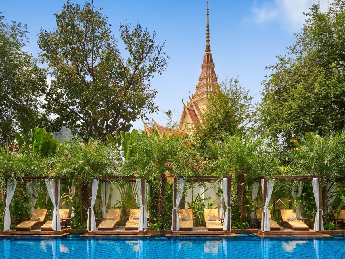 Sunbeds by the poolside at Palace Gate Hotel in Phnom Penh, Cambodia