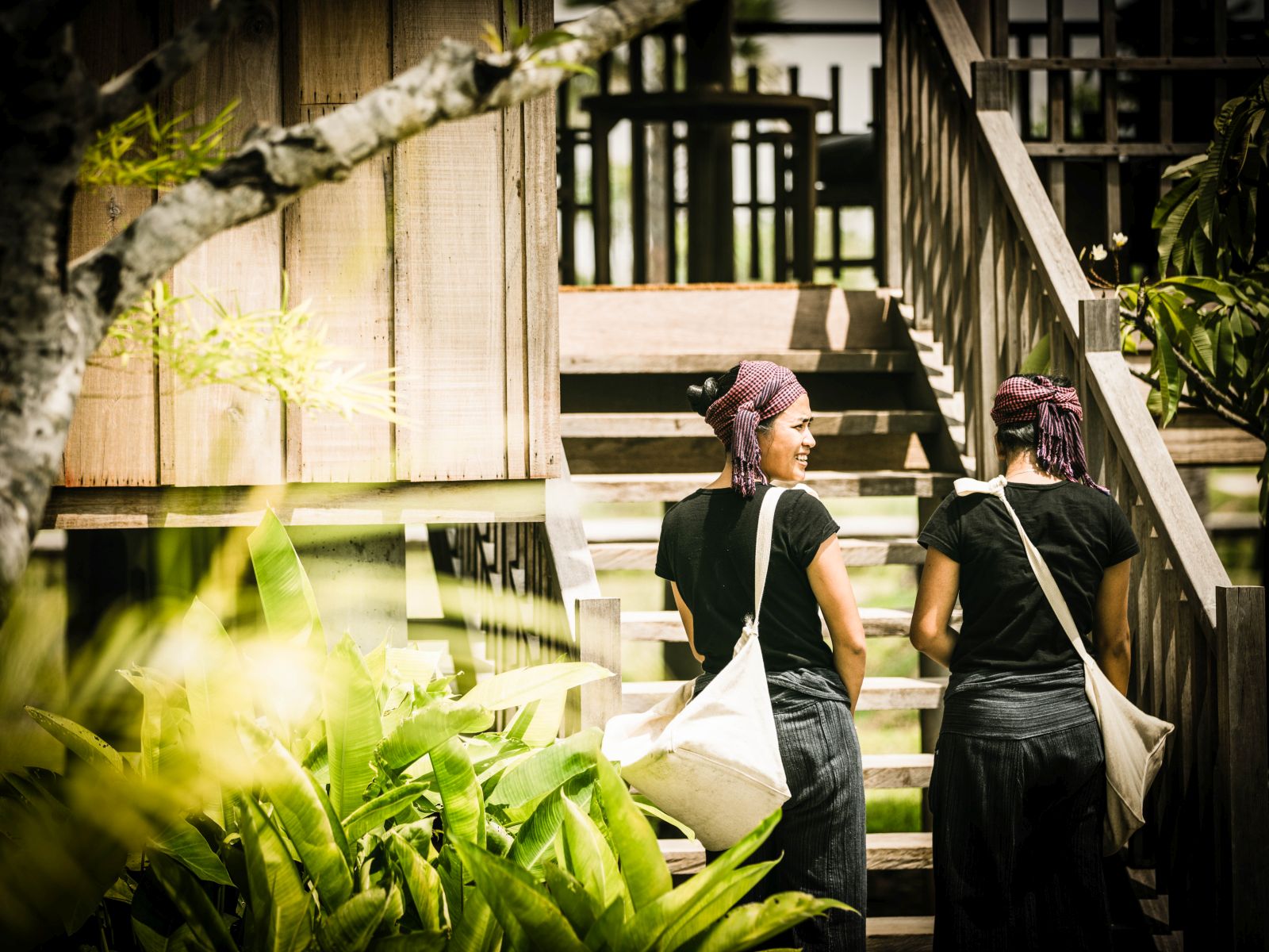 Locals in Cambodian dress at Phum Baitang hotel in Cambodia