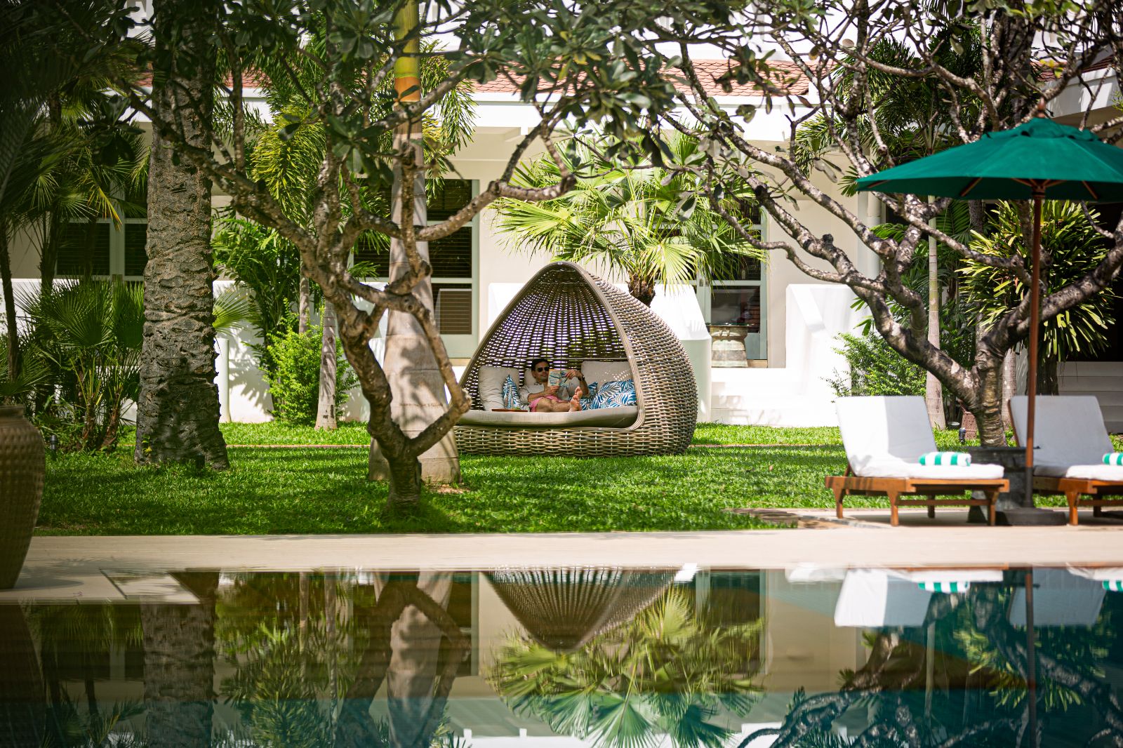 Pool terrace at Raffles Grand Hotel d'Angkor in Siem reap, Cambodia