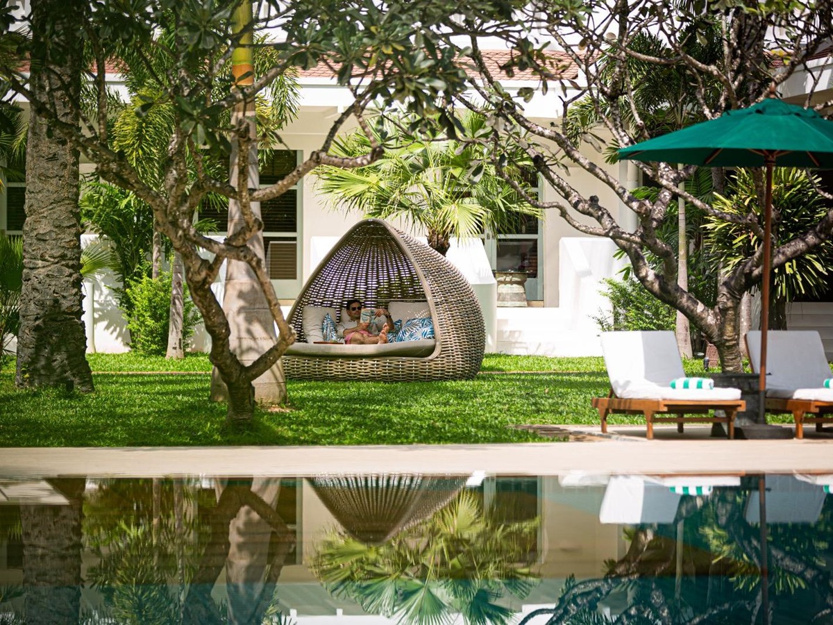 Pool terrace at Raffles Grand Hotel d'Angkor in Siem reap, Cambodia