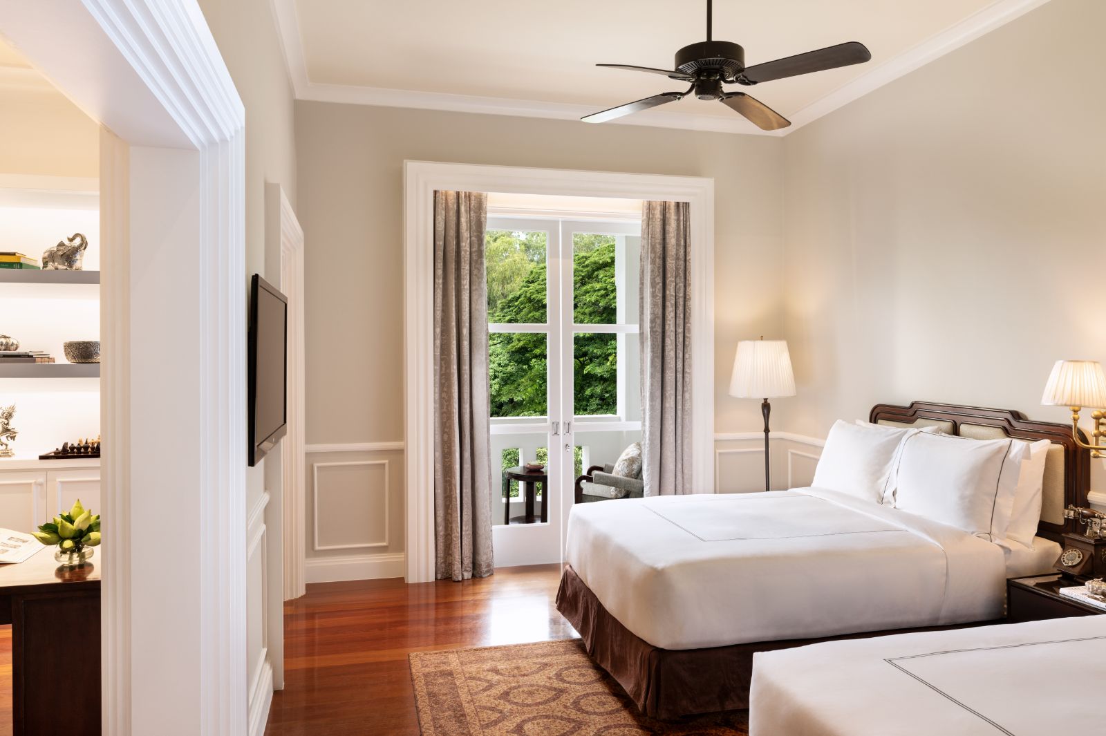 Twin guest suite bedroom at Raffles Grand Hotel d'Angkor in Siem Reap, Cambodia