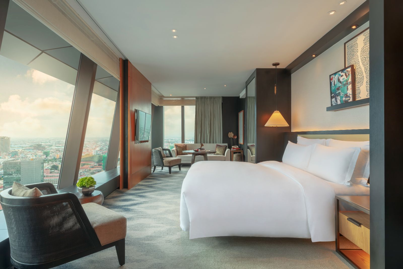 Grand Premier guest suite bedroom at Rosewood Phnom Penh in Cambodia