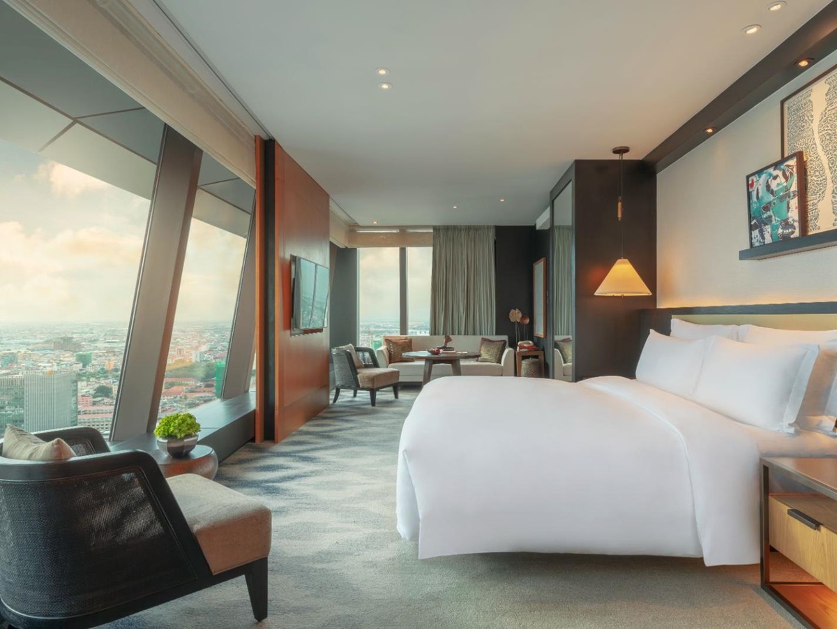 Grand Premier guest suite bedroom at Rosewood Phnom Penh in Cambodia