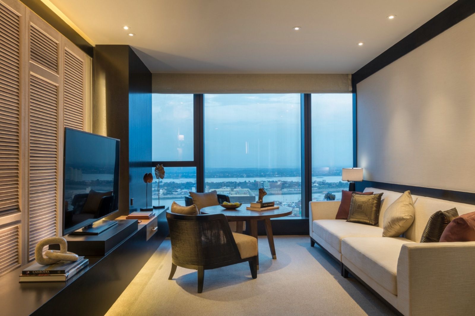 Mekong guest suite living area at Rosewood Phnom Penh in Cambodia