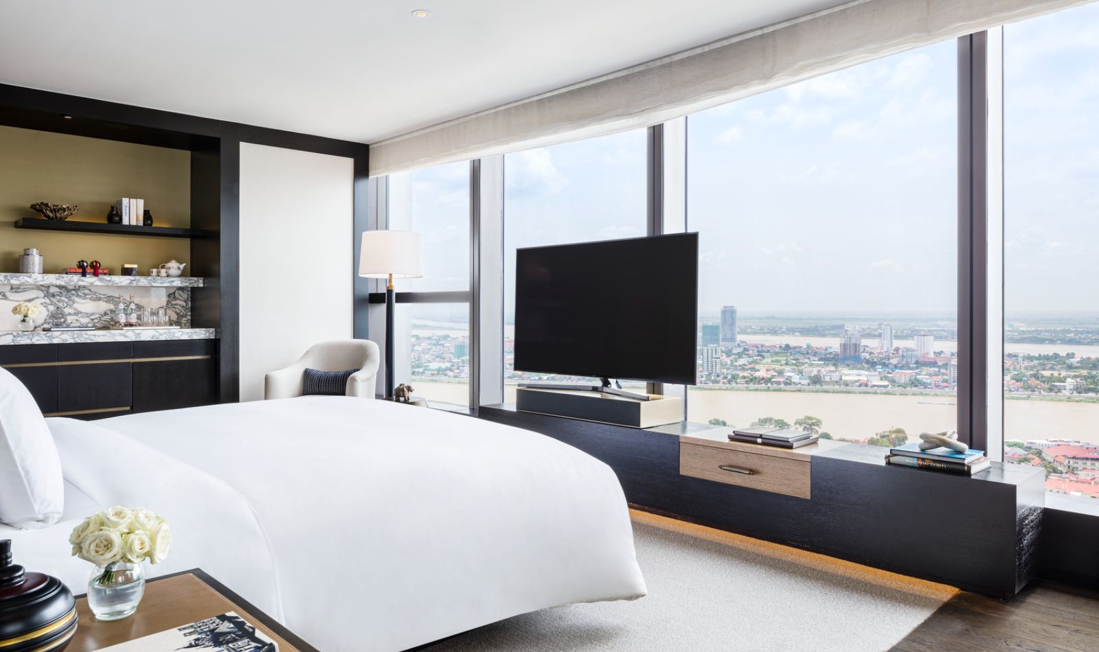 Monivong guest suite bedroom at Rosewood Phnom Penh in Cambodia