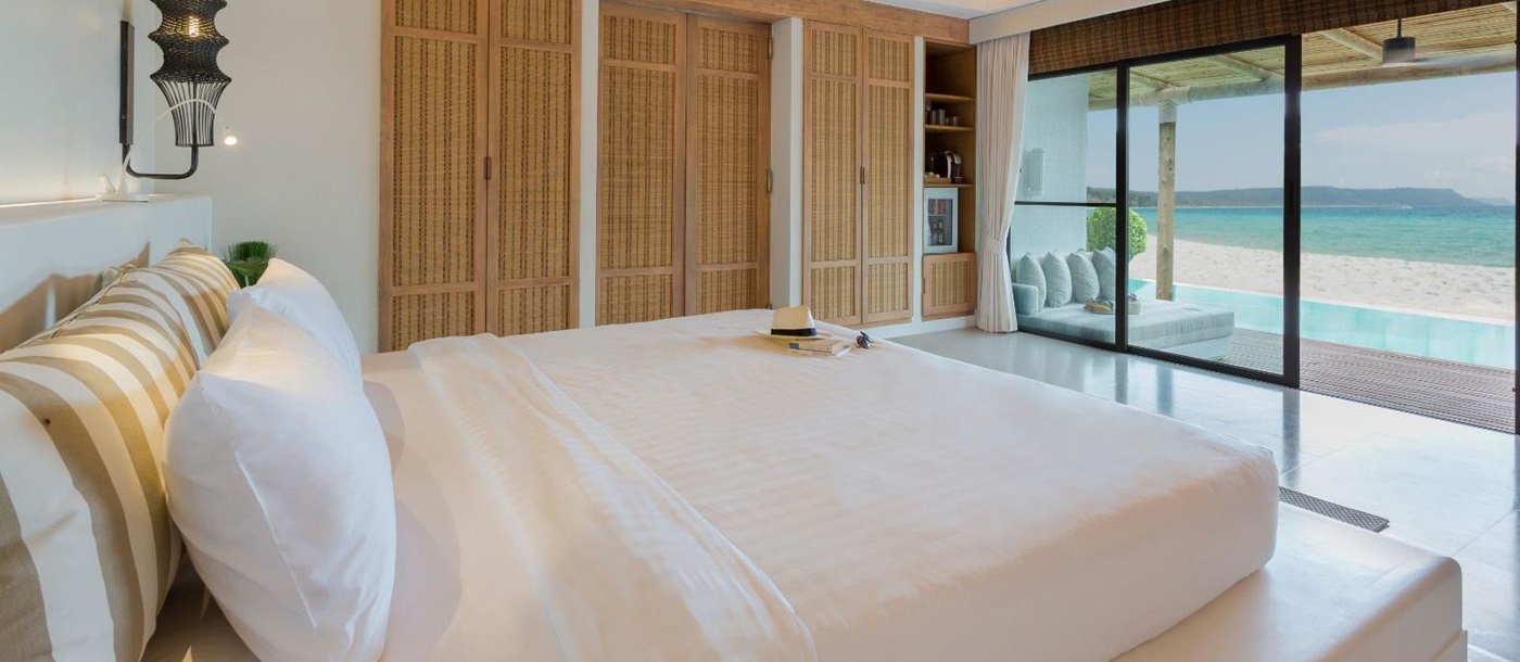 Beachfront pool villa bedroom at the Royal Sands Resort in Koh Rong, Cambodia