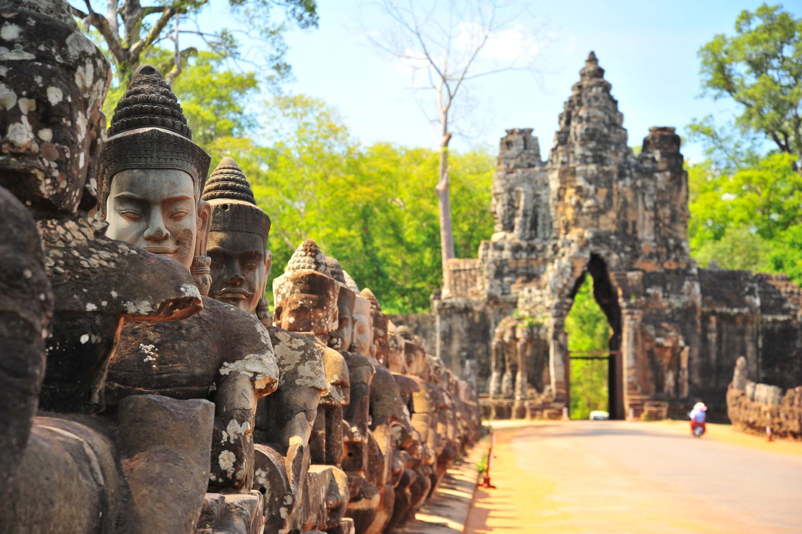 Detail of stone buddhas at the entrance to Angkor Thom in Cambodia