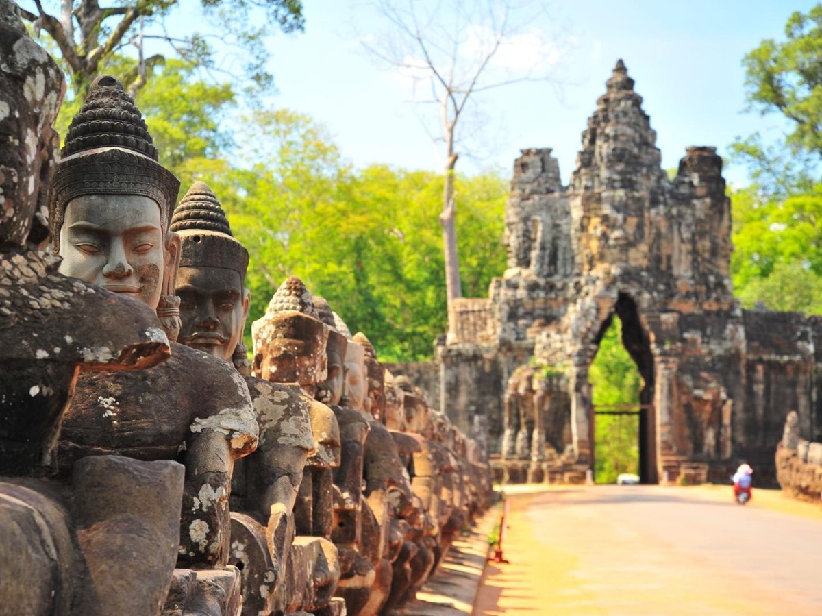 Detail of stone buddhas at the entrance to Angkor Thom in Cambodia