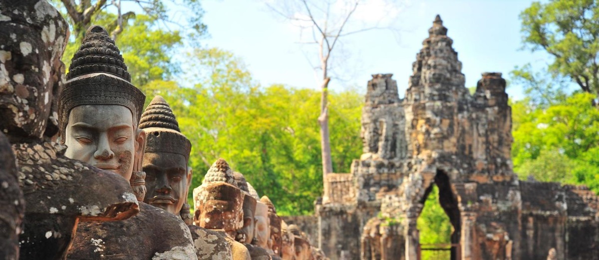 Detail of stone buddhas at the entrance to Angkor Thom in Cambodia