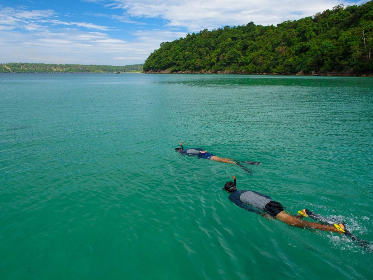 Snorkelling on the grounds of The Royal Sands beach resort on Koh Rong in Cambodia