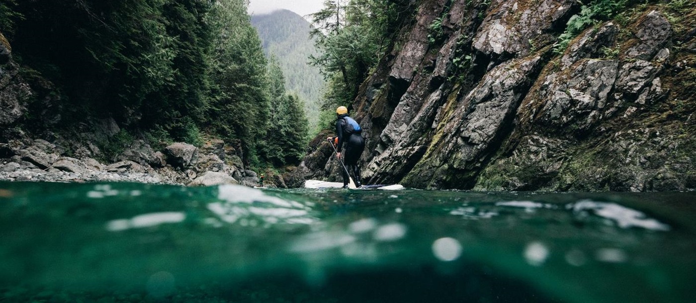 Canyoning on a river near Clayoquot Wilderness Resort in Vancouver, Canada